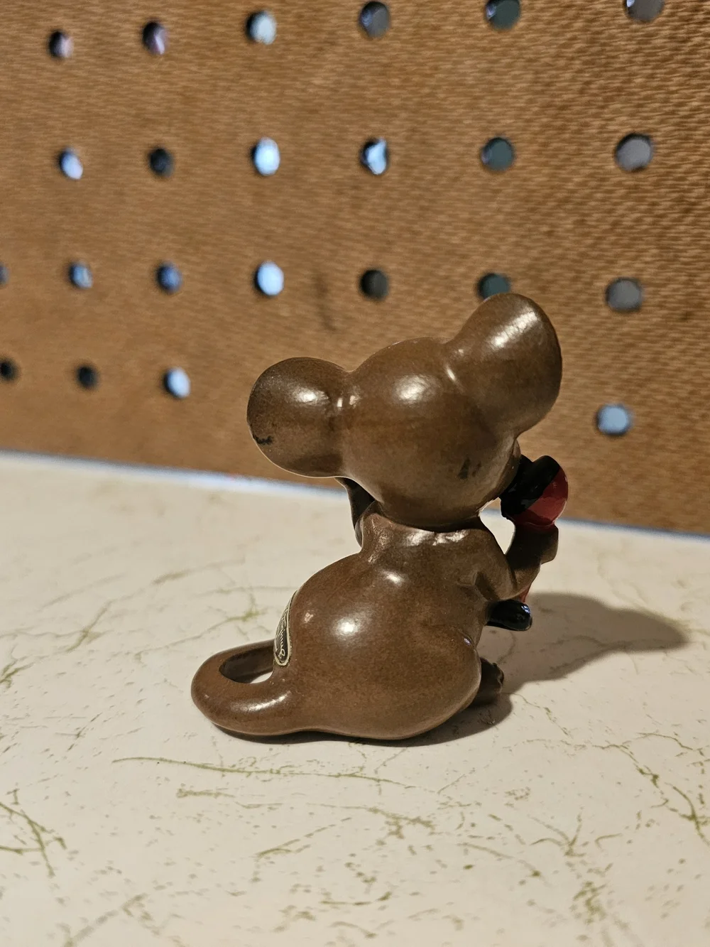 Brown Ceramic Mouse Figurine with Red Phone Decorative Accent